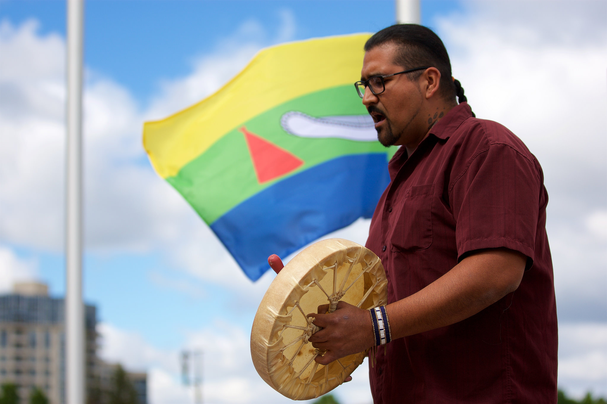 Jacob Charles of Georgina Island First Nation performs a drum ceremony